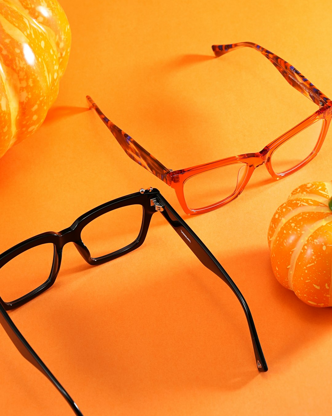 Colorful eyewear and accessories flat lay