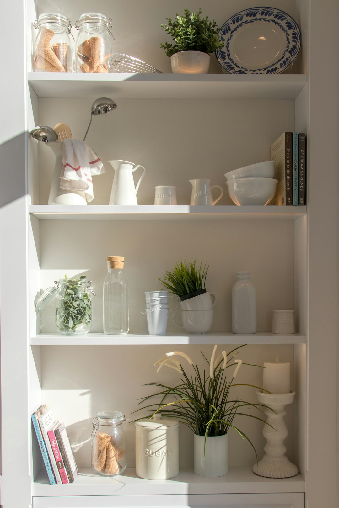 Handmade bowls and bottles displayed on shelves