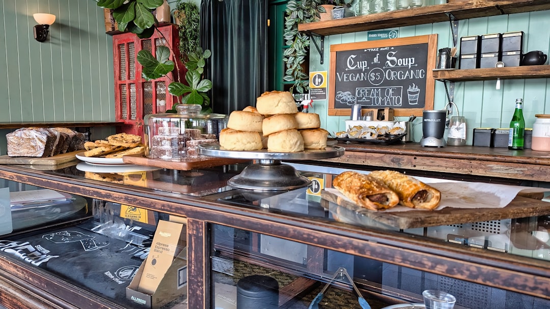 Coffee shop counter with breakfast sandwiches and pastries