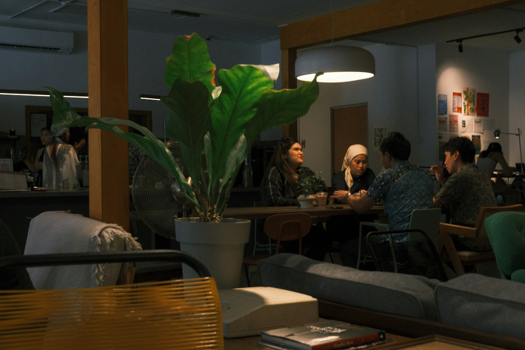 Friends gathering in a neighborhood coffee shop